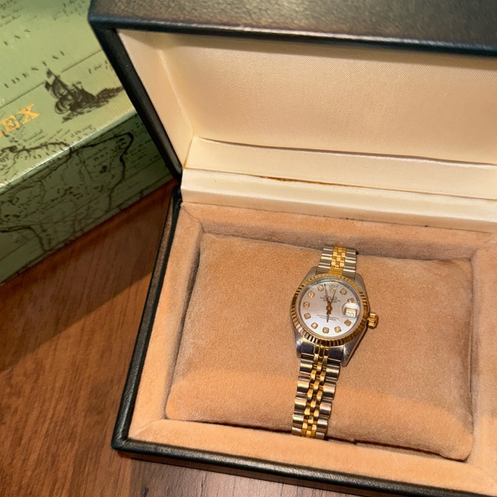 Women’s gold & silver Oyster Perpetual  Rolex. Factory mother of pearl.
